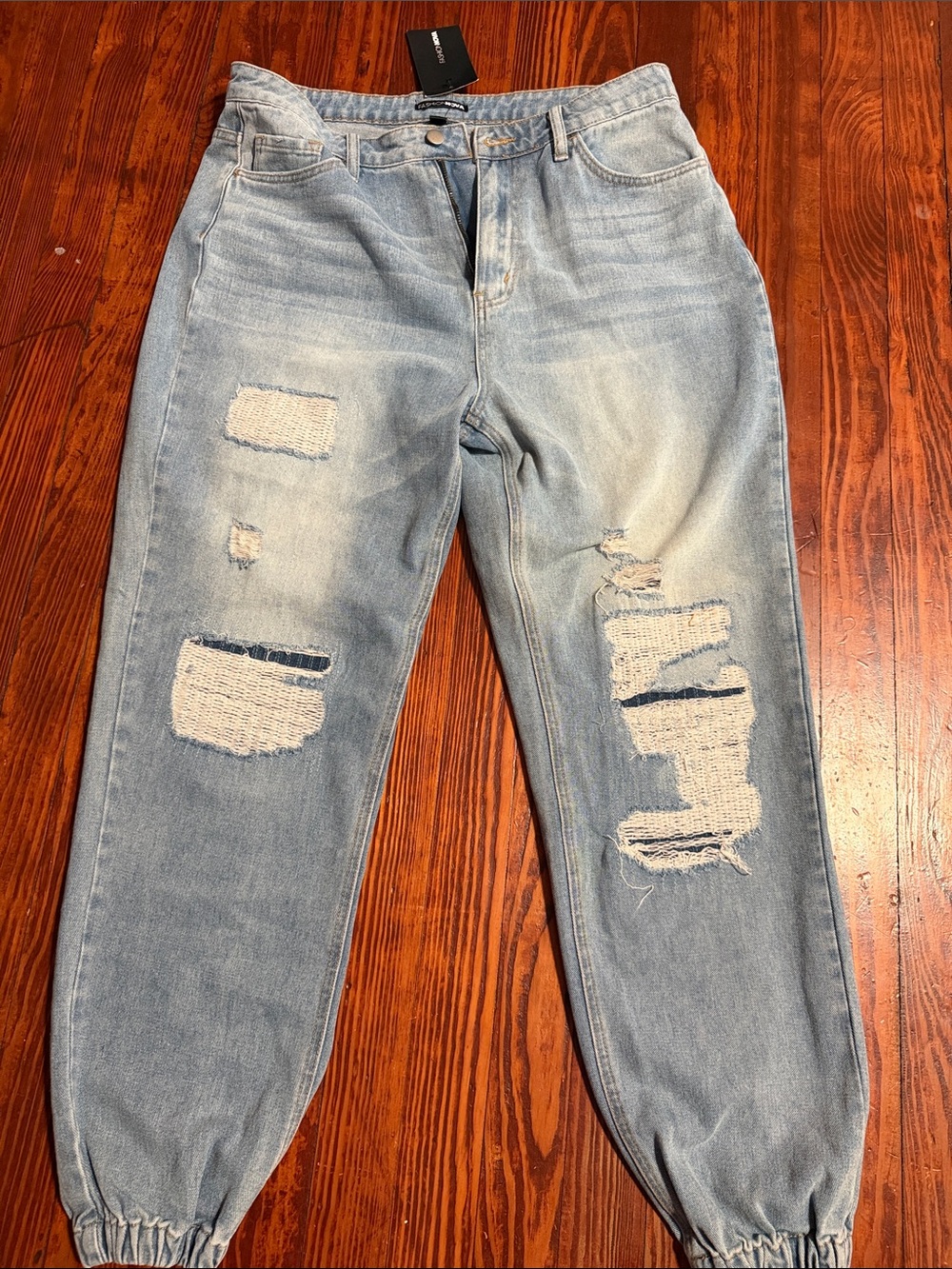 Fashion Nova Light Blue Distressed Relaxed Jeans